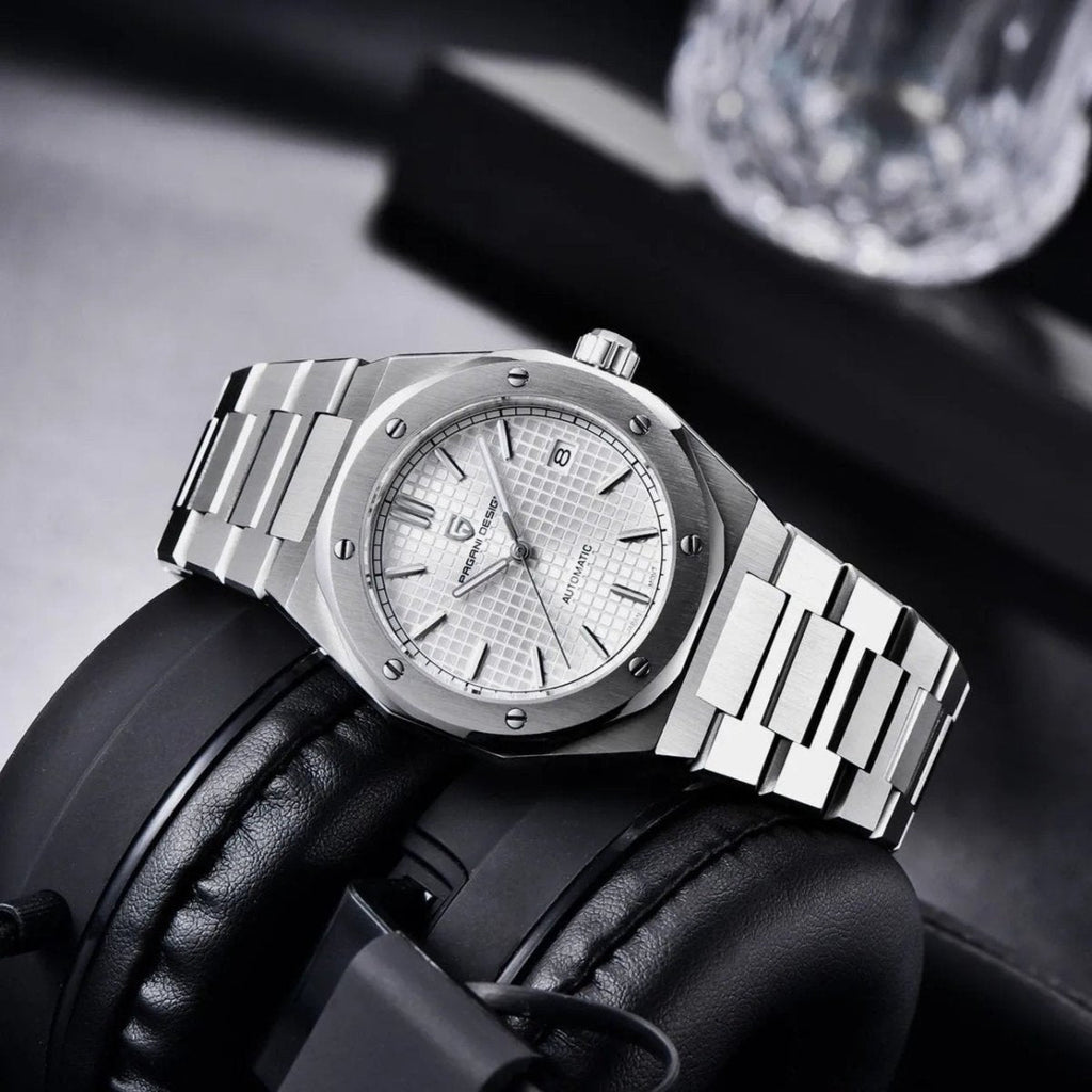 Pagani Design PD-1673 white waffle dial on headphones, light catching the polished bracelet links