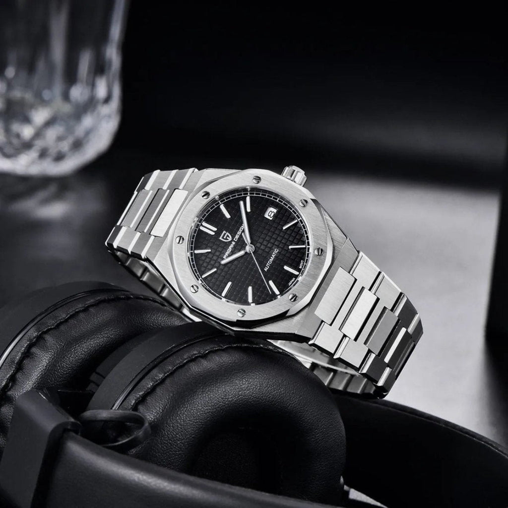 Pagani Design PD-1673 black dial angled on headphones, showing octagonal case profile and crown