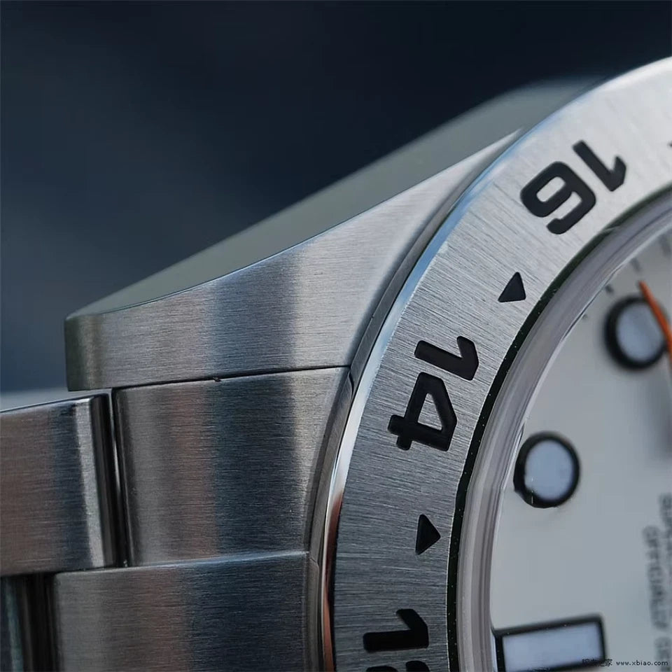 PAGANI DESIGN PD-1682 GMT Explorer II silver bezel and case closeup detail view