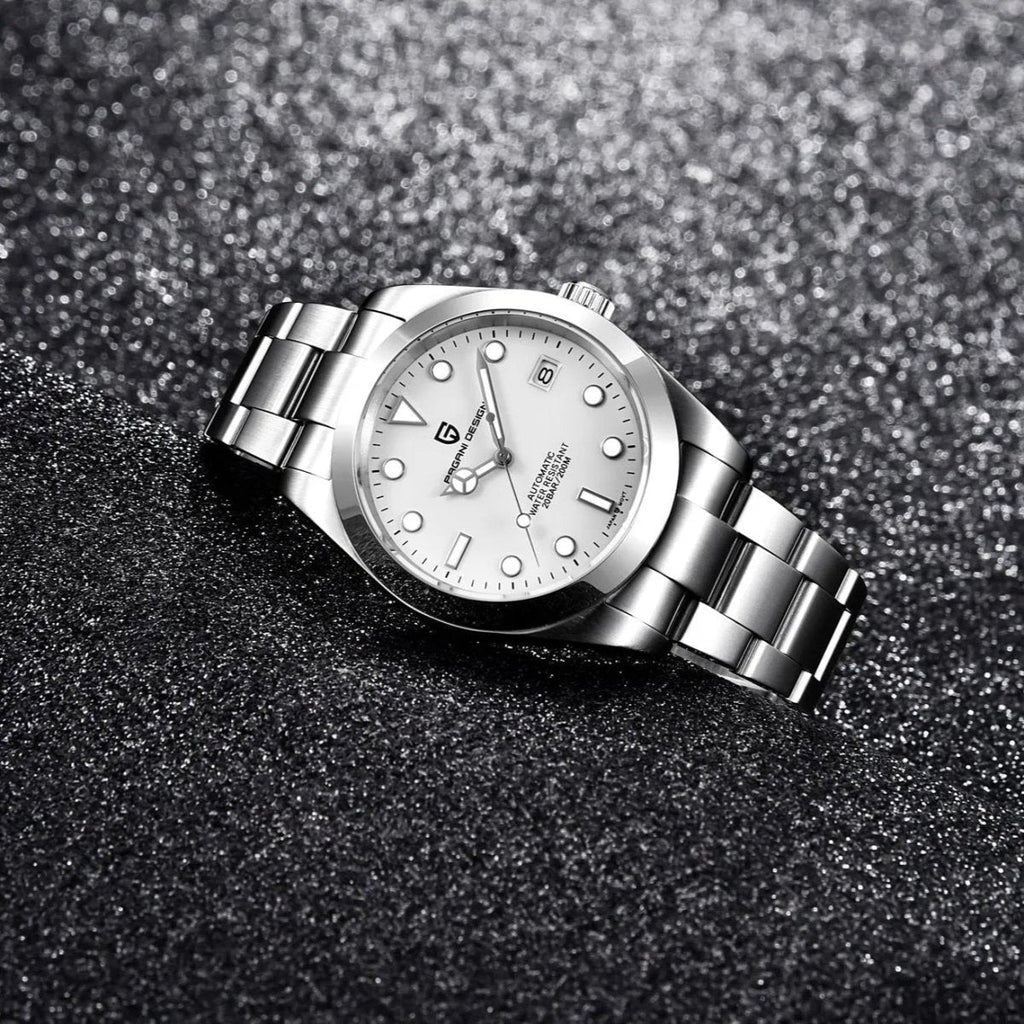 Pagani Design PD-1692 white dial angled on dark texture, showing bracelet links and clasp side