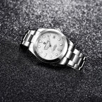 Pagani Design PD-1692 white dial angled on dark texture, showing bracelet links and clasp side