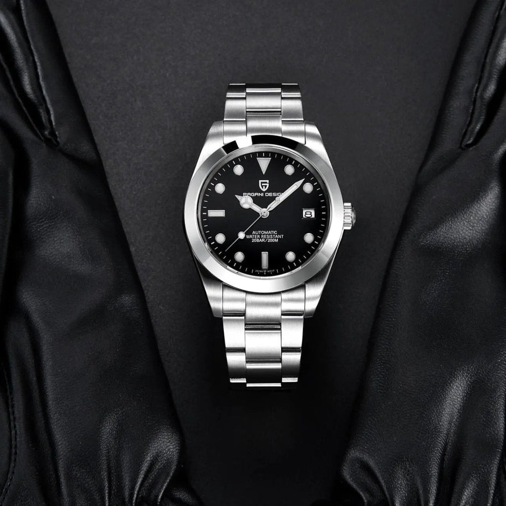 Pagani Design PD-1692 black dial laid on black leather, showing polished bezel and steel bracelet