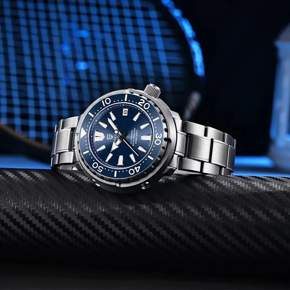 PAGANI DESIGN PD-1695 tuna diver watch with blue dial on carbon fiber surface, angled detail view