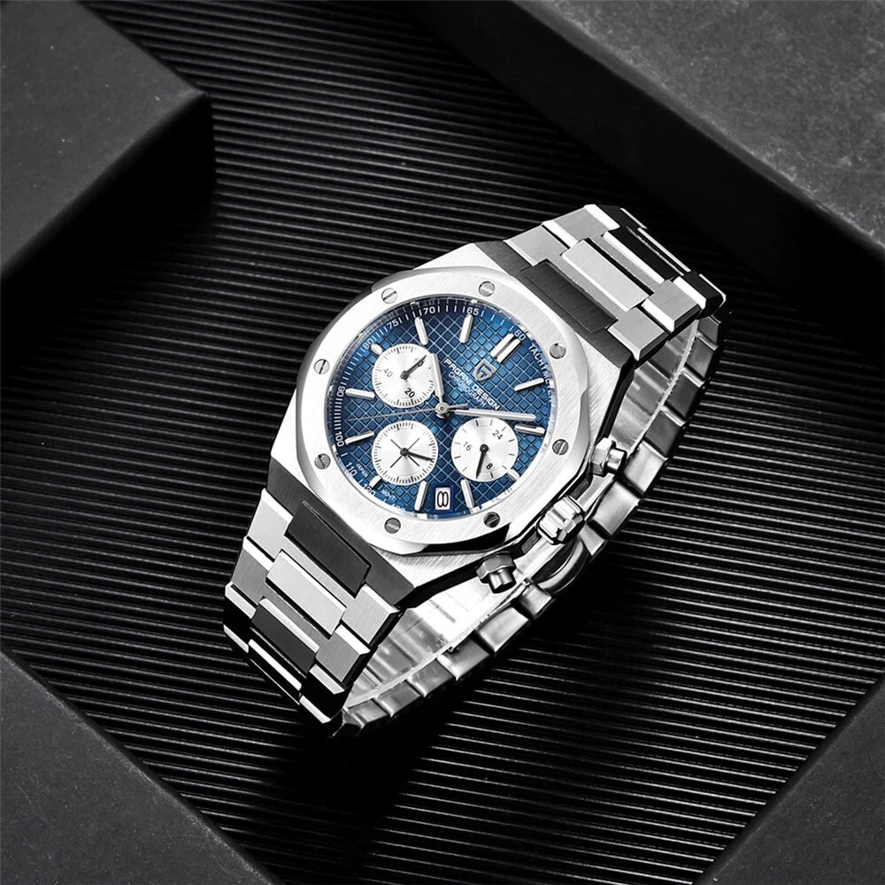 Pagani Design PD-1707 chronograph quartz watch with blue dial and polished stainless steel bracelet resting on a black textured surface, angled lifestyle view.