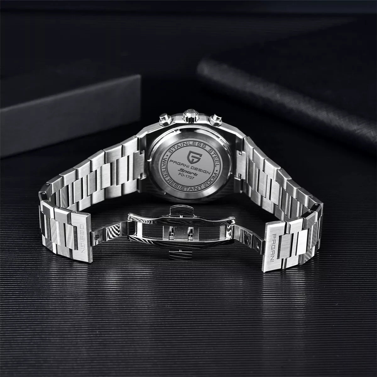 Caseback view of Pagani Design PD-1707 chronograph quartz watch showing the engraved case back and stainless steel bracelet with deployment clasp.