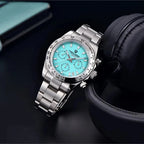 PAGANI DESIGN PD-1727 chronograph watch lifestyle shot with white dial worn outdoors by water