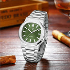 PAGANI DESIGN PD-1728 automatic watch with green textured dial on wooden desk with cigar
