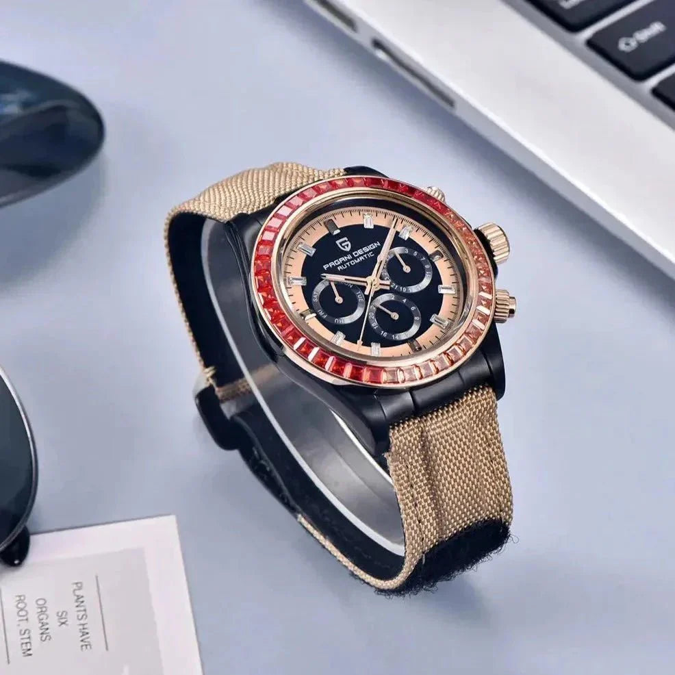 Pagani Design PD-1732 khaki nylon strap chronograph styled on a desk beside a laptop