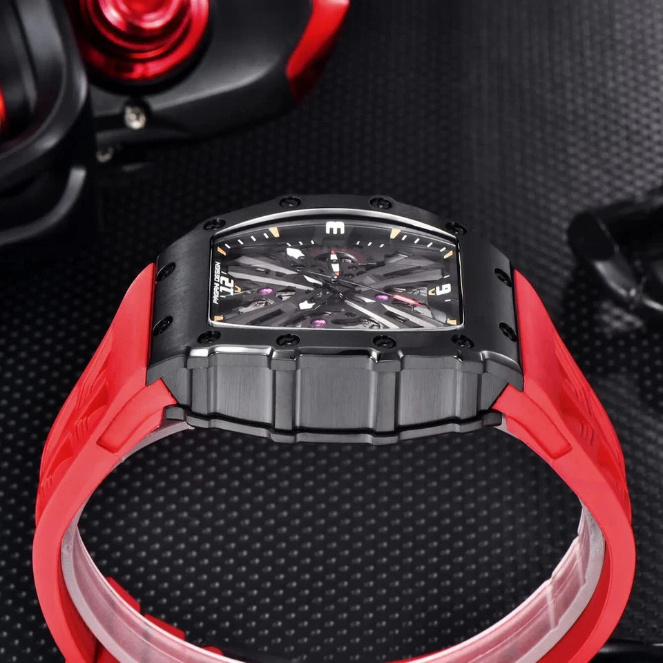 PAGANI DESIGN PD-1738 skeleton MILLE men's watch with red strap on dark textured surface