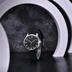Pagani Design PD-1780 black dial on black rubber strap shown in a monochrome studio arch set