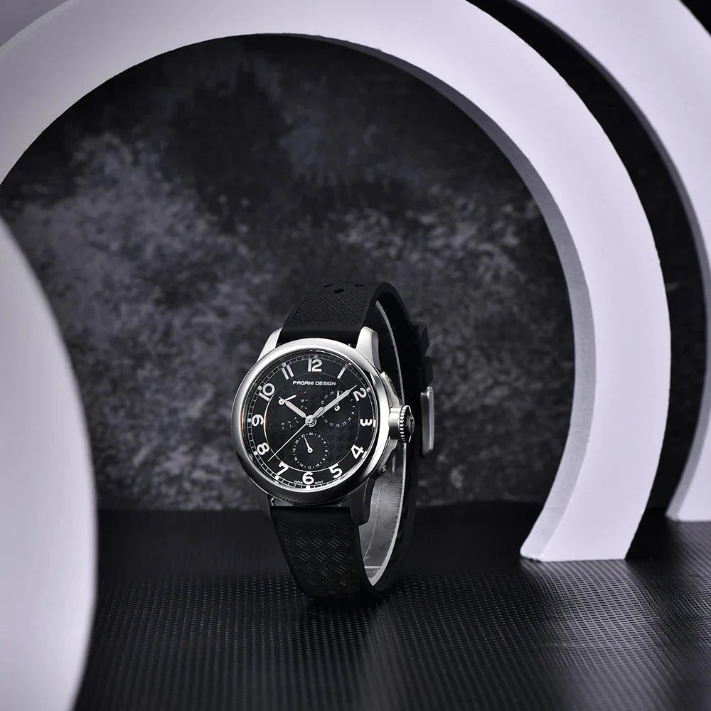 Pagani Design PD-1780 black dial on black rubber strap shown in a monochrome studio arch set