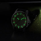 Pagani Design PD-1780 lume shot with green glowing Arabic numerals and hands in the dark