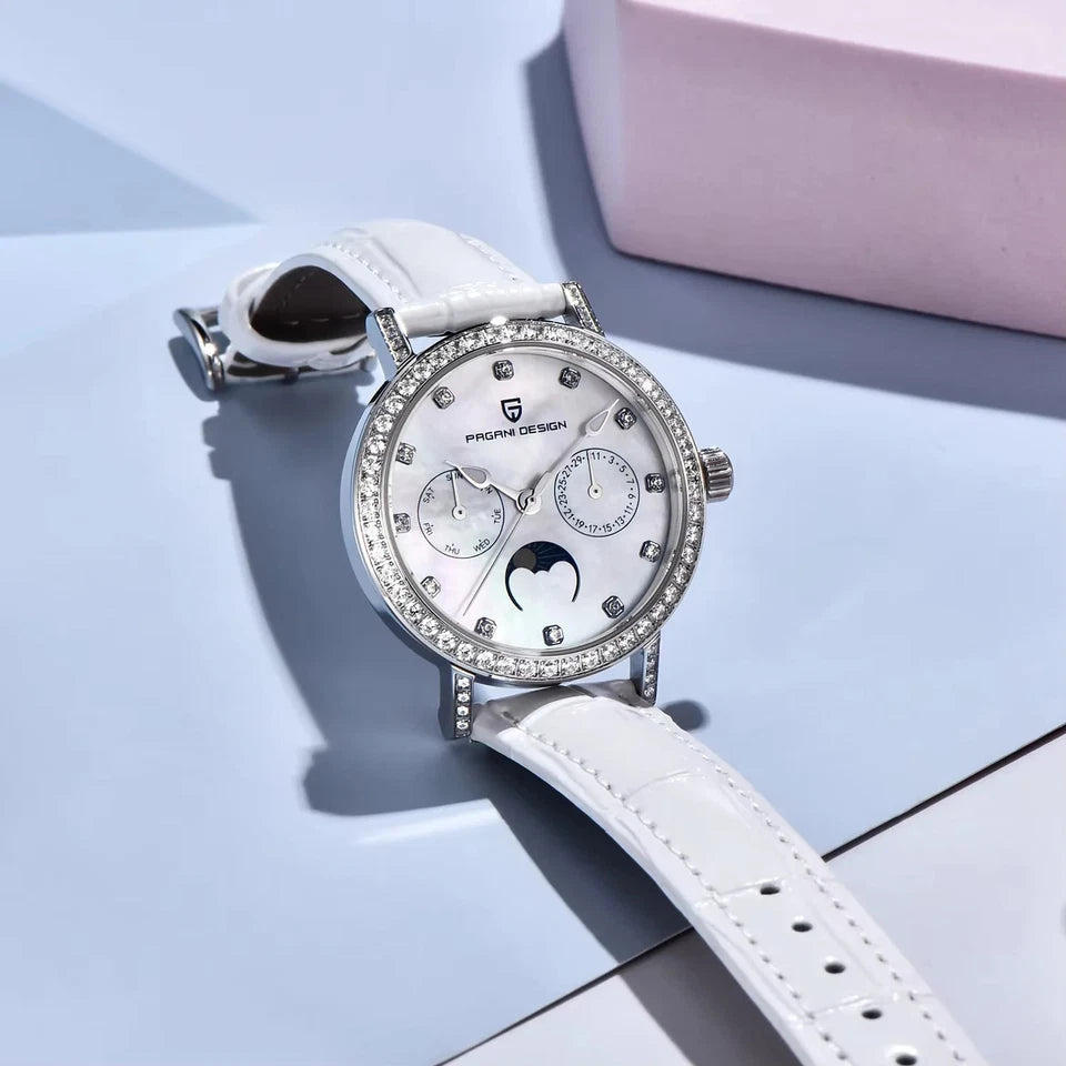Lifestyle photo of Pagani Design PD-1789 quartz watch white dial silver case white leather strap on light blue surface