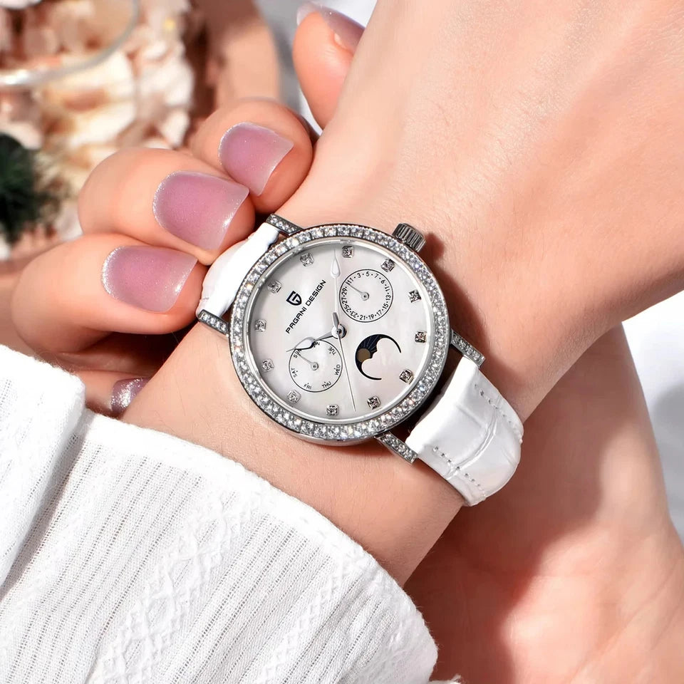 Wrist shot of Pagani Design PD-1789 quartz watch white dial silver case white leather strap moonphase