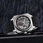 Pagani Design PD-1791 black rubber strap against dark wood, skeletonised dial and exposed wheels