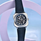 Pagani Design PD-1791 blue skeleton dial with dark leather strap against a pastel studio backdrop