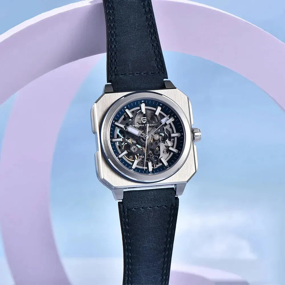 Pagani Design PD-1791 blue skeleton dial with dark leather strap against a pastel studio backdrop