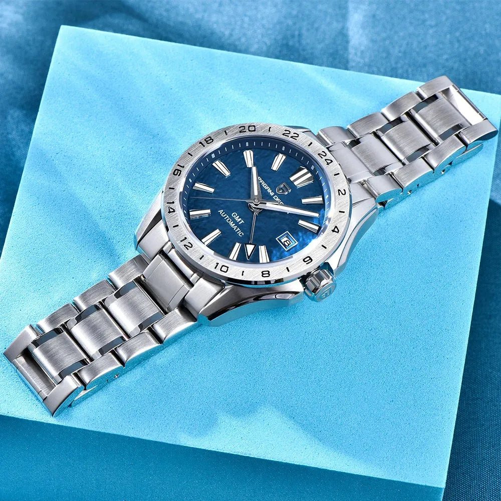 Pagani Design PD-1792 blue GMT dial laid flat on a blue block, full bracelet visible