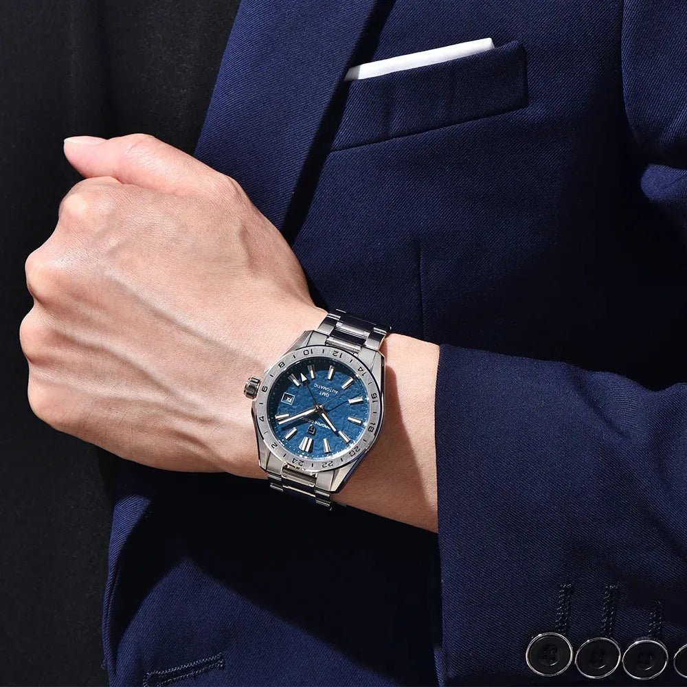 Pagani Design PD-1792 blue dial GMT worn on the wrist with a navy suit