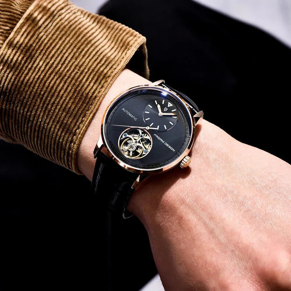 Pagani Design PD-1796 rose gold black dial worn on wrist with corduroy sleeve