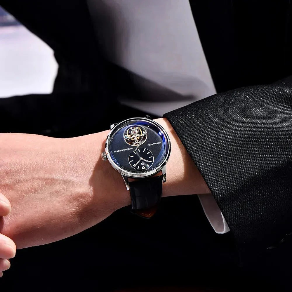 Pagani Design PD-1796 blue dial steel model worn on wrist under a suit cuff