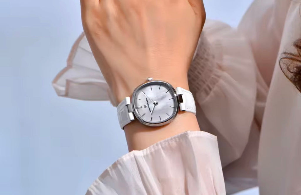 Pagani Design PD-1825 white dial watch worn on a woman's wrist showing its 32mm case size