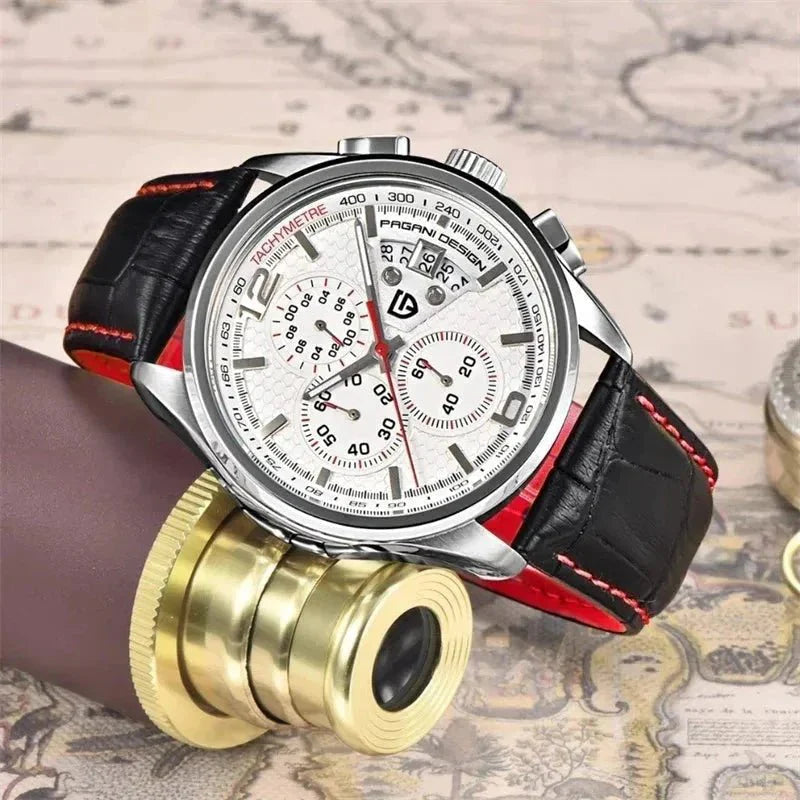 Pagani Design PD-3306 white dial resting on a brass magnifier over a vintage map
