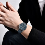 Man wearing PAGANI DESIGN PD-YS008 VK63 chronograph watch with blue dial and fabric strap