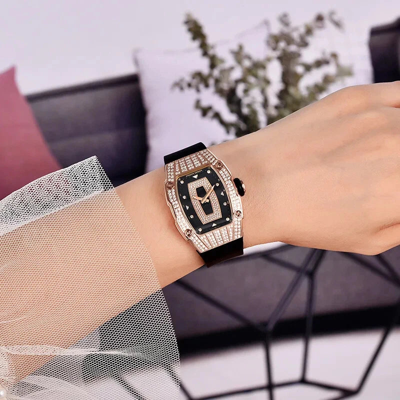 Woman wearing PAGANI DESIGN PD-YS013 tonneau watch with rose gold crystal case and black dial