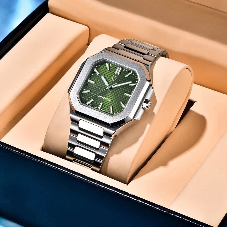 Angled view of Pagani Design PD-YS019 square quartz watch with green dial and stainless steel bracelet, presented on a pillow in a display box.
