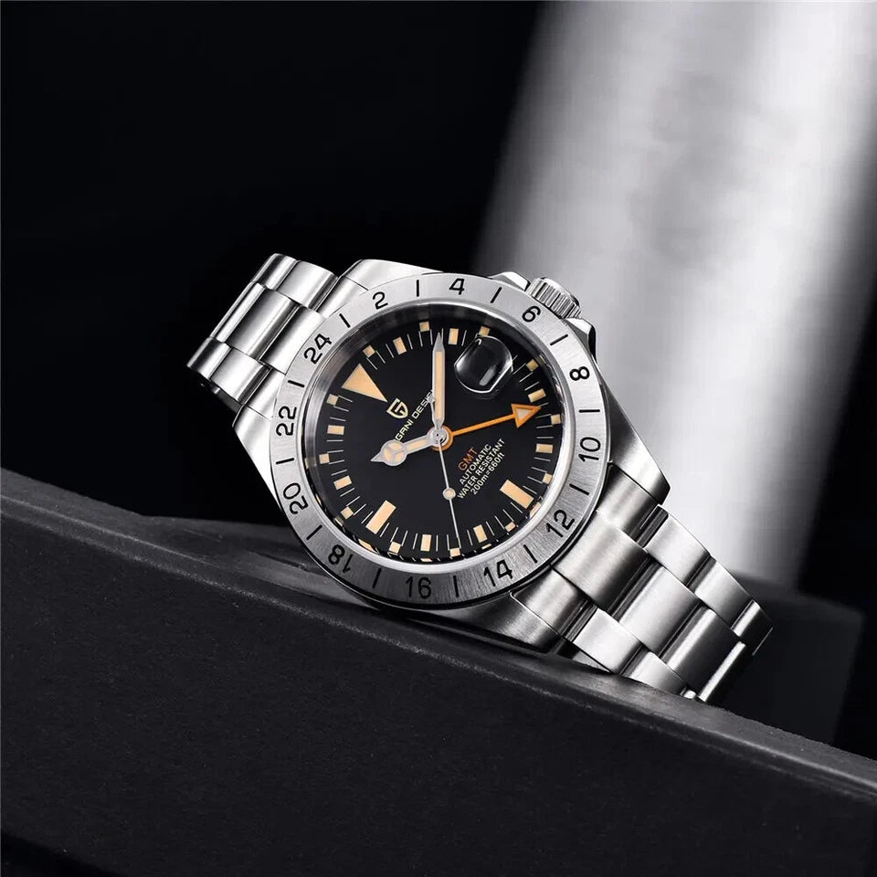 Pagani Design PD-1693 men's luxury automatic GMT watch with black dial and silver bracelet on dark background