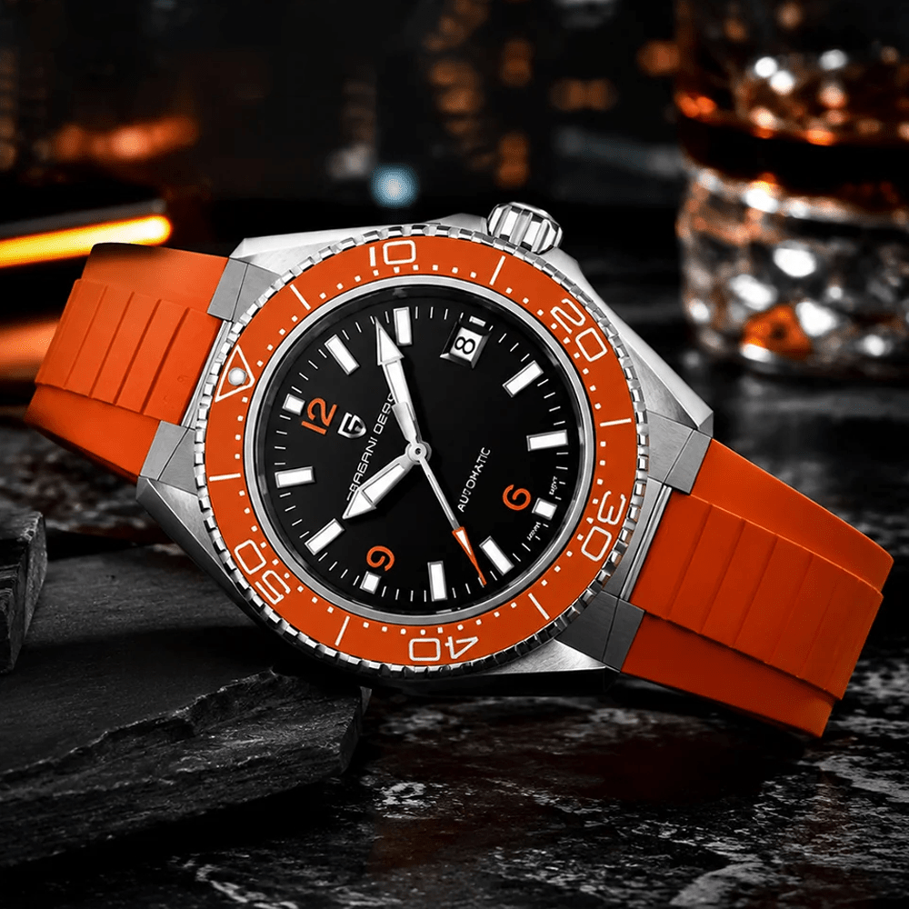 Pagani Design PD-YS034 orange bezel diver on orange rubber strap staged on slate in bar lighting