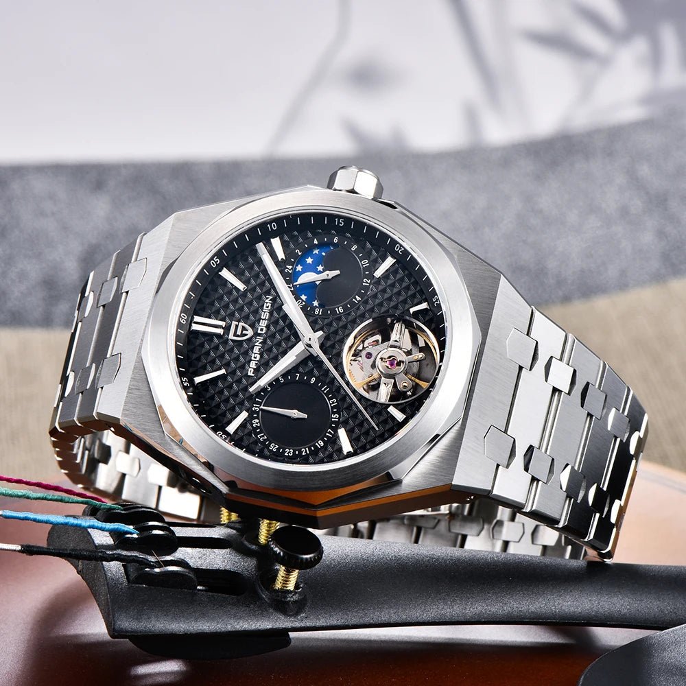 Pagani Design PD-YS036 silver black watch on its side showing the integrated steel bracelet