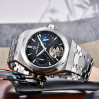 Pagani Design PD-YS036 silver black watch on its side showing the integrated steel bracelet
