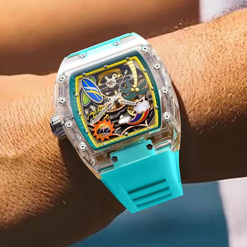 Close-up wrist shot of PINDU 6633 Summer Beach tonneau mechanical watch featuring a tropical skeleton dial with palm tree and sun motif, transparent resin case, luminous display, and turquoise silicone strap, worn on the wrist.