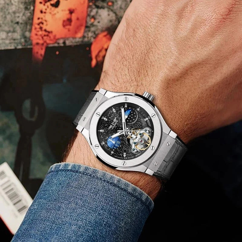 Wrist shot of PINDU Design 6537 automatic mechanical watch featuring moonphase and skeleton tourbillon, stainless steel case and bracelet, black starry dial, worn on wrist