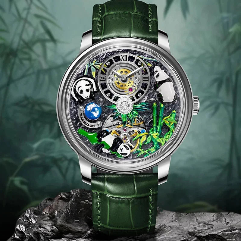 PINDU M27 skeleton dial mechanical watch with rotating crystal ball, stainless steel case, green leather strap, lifestyle photo on rock with bamboo background