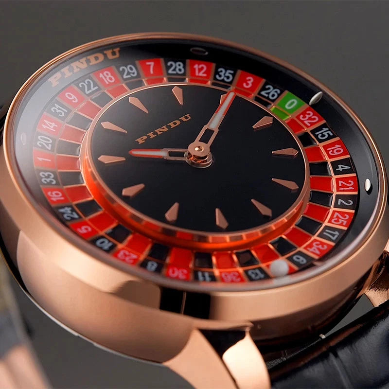 Close-up angled view of Pindu NH35A casino tourbillon rotating roulette mechanical watch featuring a rose gold case, black dial with red and green roulette numbers, and polished rose gold bezel.