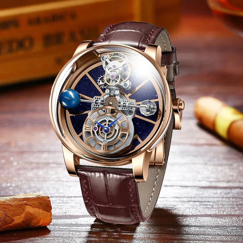 Pindu P5015 celestial tourbillon mechanical watch with rose gold case and brown leather strap, skeleton dial with starry sky design and miniature planet, placed on a wooden table with cigar and whiskey glass blurred in the background.