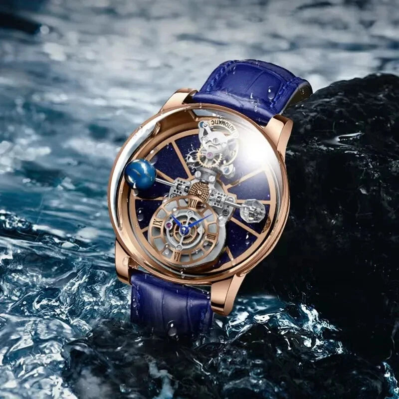 Pindu P5015 celestial tourbillon watch with rose gold case and blue leather strap, skeleton dial featuring starry sky design and miniature planet, shown on a wet rock with water splash demonstrating its 5ATM water resistance and mechanical movement.
