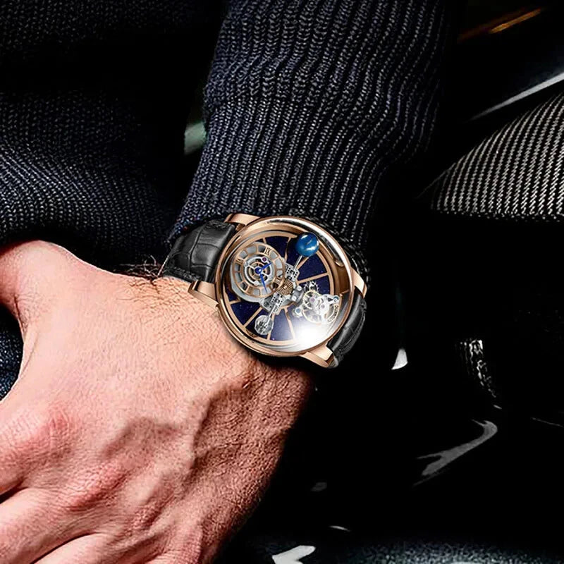 Wrist shot of Pindu P5015 celestial tourbillon watch with rose gold case, black leather strap, skeleton dial featuring starry sky design and miniature planet, showcasing its mechanical movement on a man's wrist with dark background.