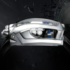 PINDU P5023 side profile showing the sculpted steel case flank and blue suspension spring