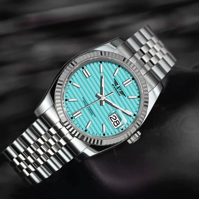 PINDU PD6525 automatic watch lifestyle photo with sky blue dial on dark surface