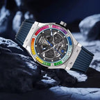PINDU PD6552 rainbow bezel skeleton watch with blue strap on rocky lifestyle scene