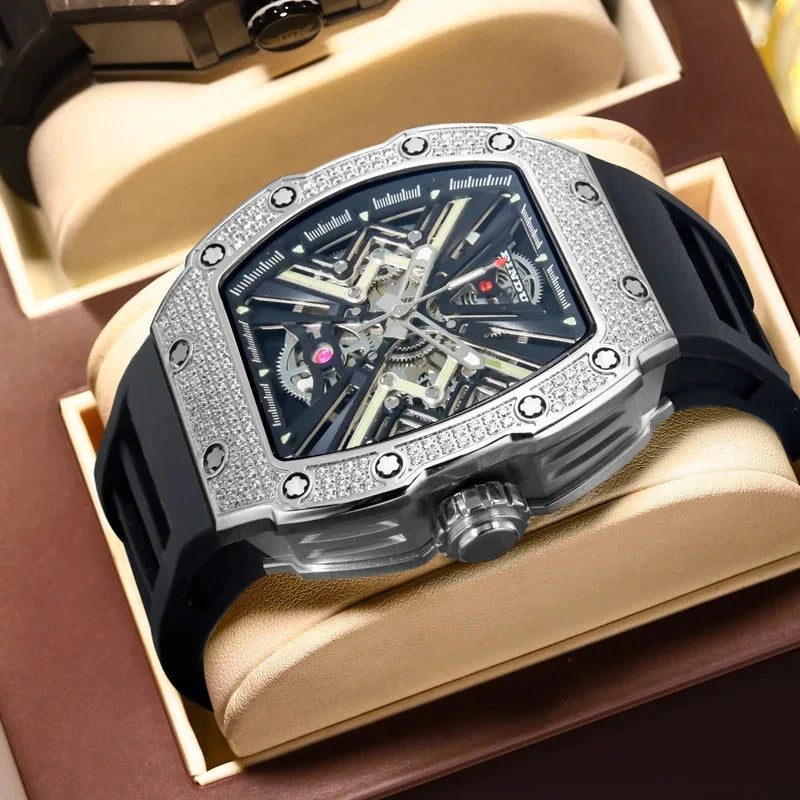 Pindu PD65550 wine barrel mechanical watch displayed in a presentation case, featuring skeleton dial, diamond-set bezel, stainless steel case, sapphire crystal, and black silicone strap.