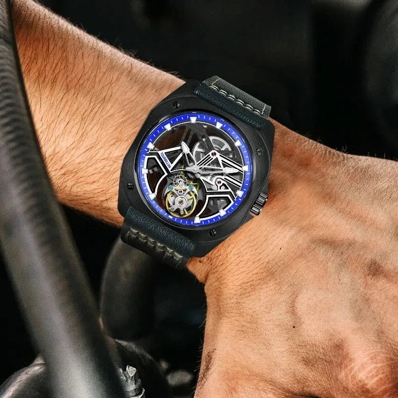 PINDU PD6568 black PVD blue-ring tourbillon worn on a wrist at a car steering wheel