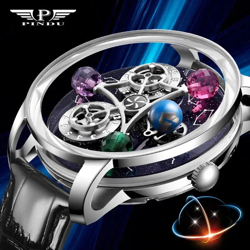 PINDU PD6573 branded close-up of the domed sapphire, steel case, crown and jewelled planets