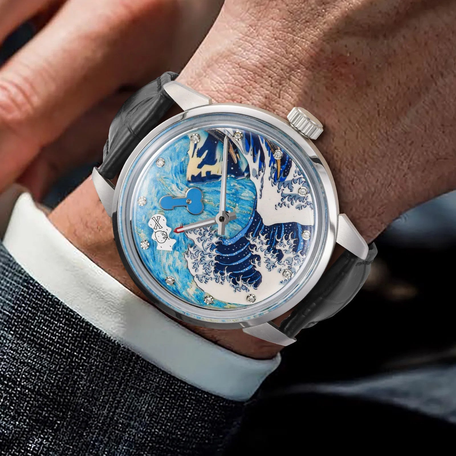 PINDU PD6668 Wave Dial automatic watch with blue dial on wrist with suit cuff