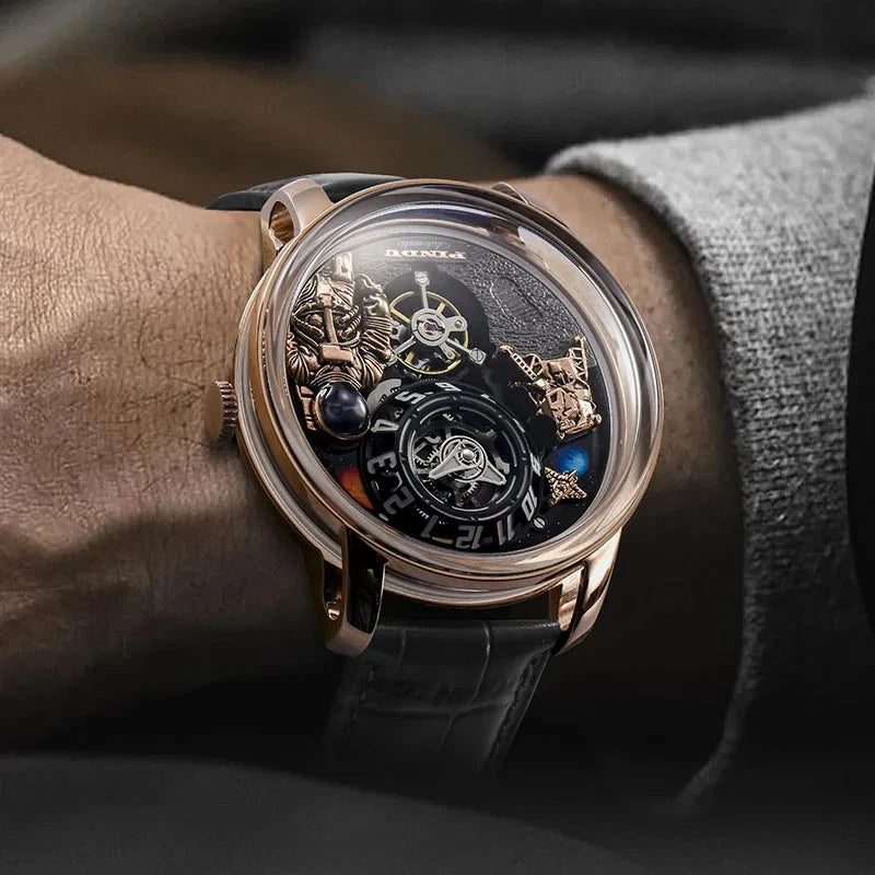 Wrist shot of Pindu W2101B Space Series mechanical watch featuring three-dimensional astronaut and planet motif dial, rose gold case, black leather strap, and mechanical movement, worn on wrist with grey sleeve.
