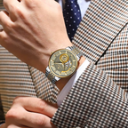 POEDAGAR 1416 tourbillon watch with two-tone steel bracelet on wrist with plaid jacket